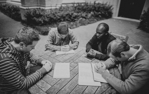 Small group of Christians meeting together for Bible study, fellowship, and mutual support.